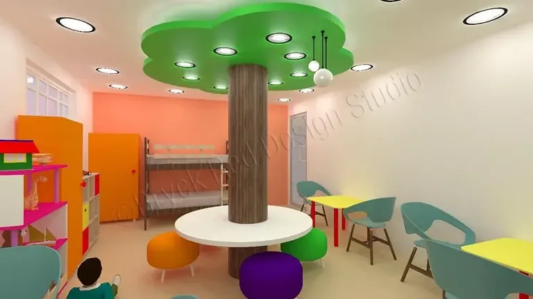 Classroom with a green tree-canopy ceiling around a timber column, bunk beds and child-height tables.