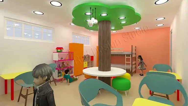 Classroom with a sculpted tree column and child-height furniture.